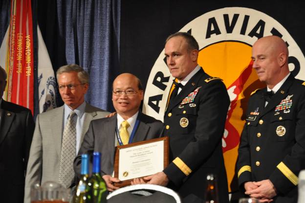AWARD CEREMONY Shek Hong received the Award from Lieutenant General James Pillsbury, Deputy Commanding General, US Army Materiel Command  and Major General James Myles, Commanding General, US Army Aviation and Missile Command. 